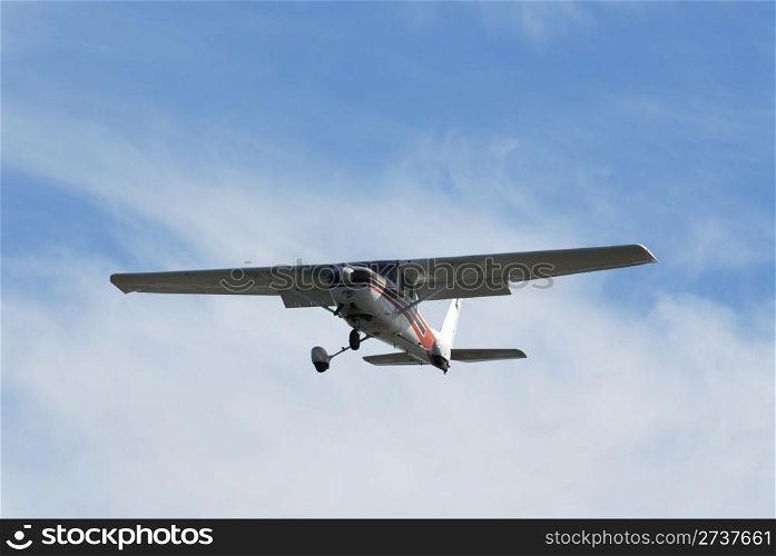 Light plane landing at Palo Alto Airport, California