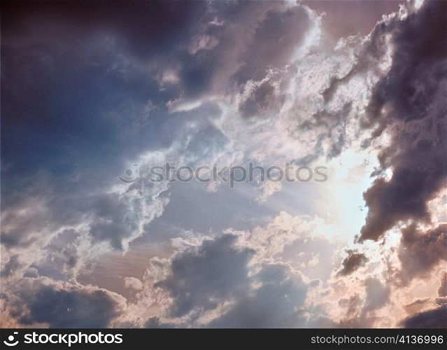 Light Shining from Behind Clouds