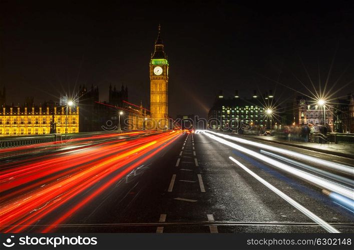 Light Trails of cars and traffic on Westminster Bridge, London at Night with The Houses of Parliament and Big Ben