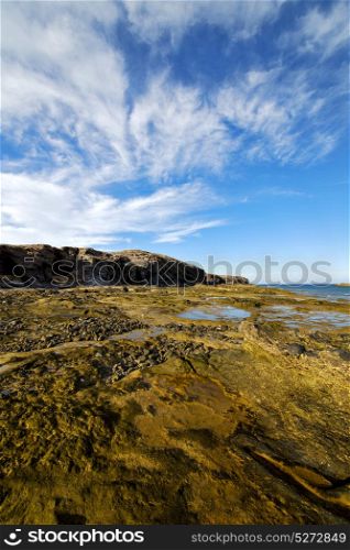 light water in lanzarote isle foam rock spain landscape stone sky cloud beach
