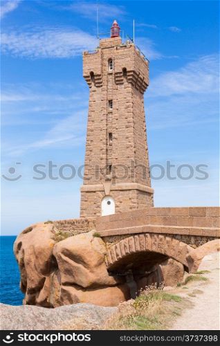 Lighthouse and rocks on Pink Granite Coast in Brittany, in northwestern France.