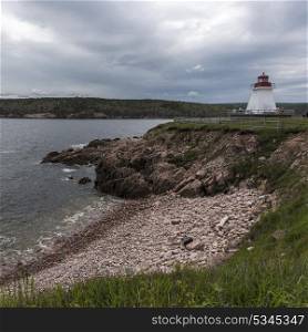 Lighthouse at coast, Neil&rsquo;s Harbour, Cape Breton Island, Nova Scotia, Canada