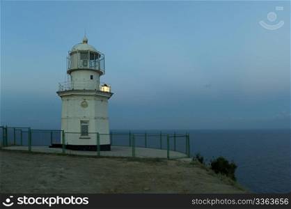 Lighthouse at dusk in Crimea peninsula, Ukraine