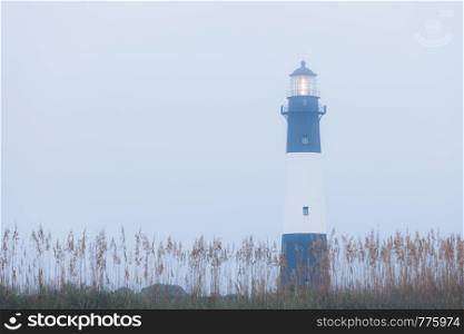 Lighthouse at foggy morning, Tybee island, USA