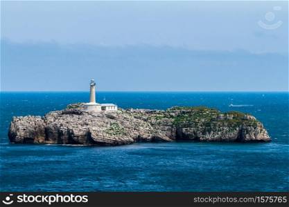 Lighthouse at the Mouro island, Santander, Spain. Lighthouse in Mouro Island