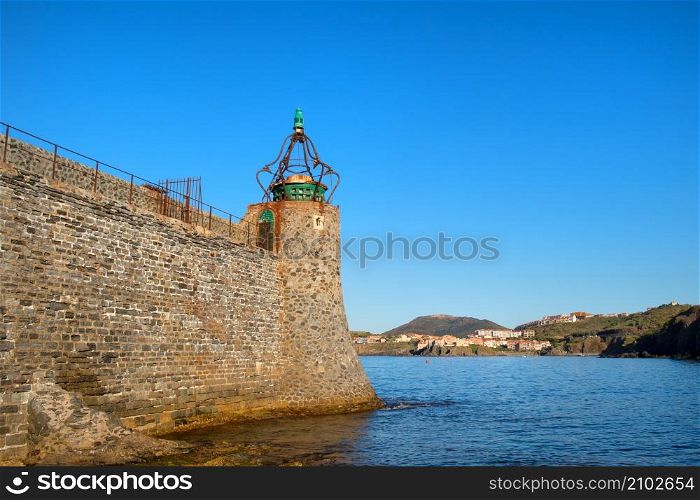 Lighthouse in French village Collioure with view