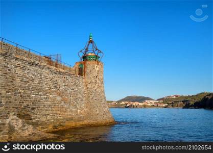 Lighthouse in French village Collioure with view