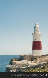 Lighthouse in Gibraltar, blue sky and sea. Lighthouse in Gibraltar