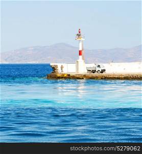 lighthouse in the mediterranean sea cruise greece island in santorini europe boat harbor and pier