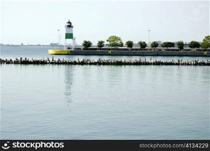 Lighthouse in the sea, Chicago Harbor Lighthouse, Chicago, Illinois, USA