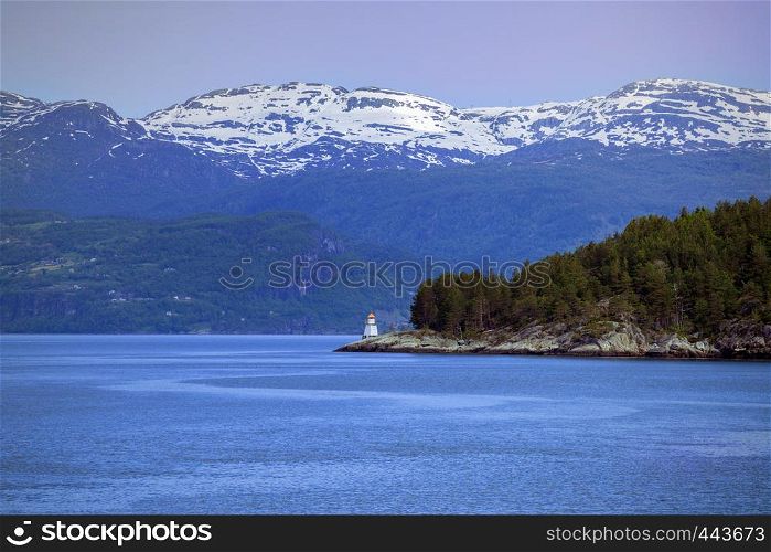 lighthouse on a fjord shore, norway