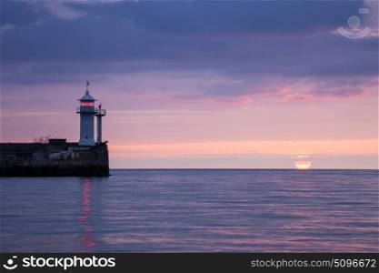 Lighthouse on sunrise. Yalta, Crimea, Ukraine