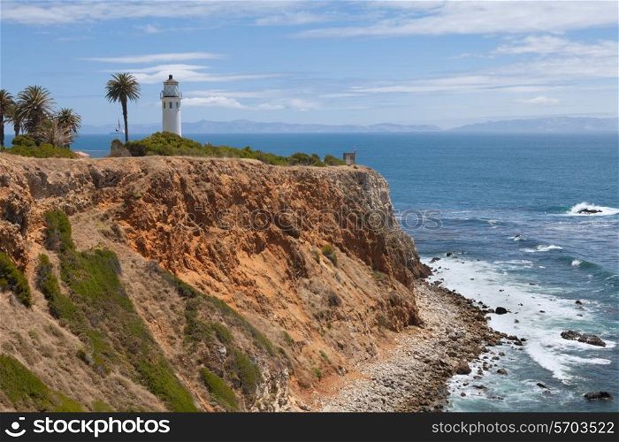 Lighthouse on the hill above ocean&#xA;