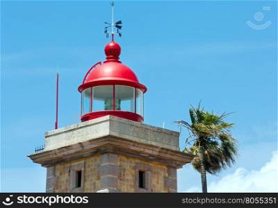 Lighthouse top on sky background (Ponta da Piedade cape, Lagos, Algarve, Portugal).