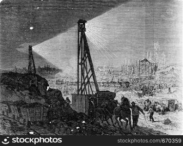 Lighting a building site at the electric light, vintage engraved illustration. Industrial encyclopedia E.-O. Lami - 1875.