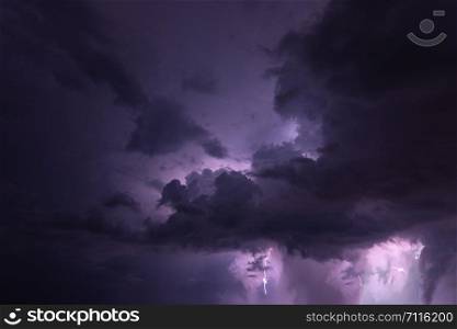 Lightning and rain clouds at night