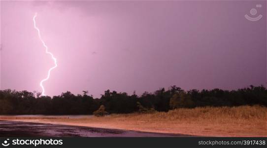Lightning Strkes over a river in southeast Texas