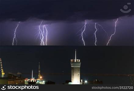 lightnings over the port of Genoa on a stormy night