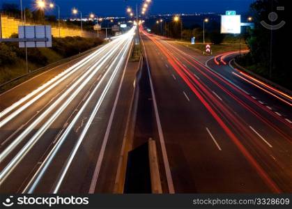 Lights on Cars in Motion on Night Highway