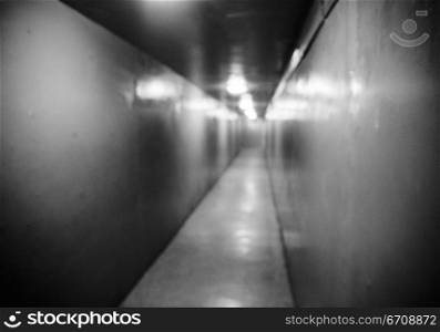 Lights shining in an empty corridor