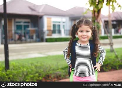 Liitle girl ready to go to school. Back to school concept. Hapiness and Lifestyle theme.