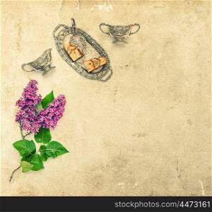 Lilac flowers bouquet. Coffee tea pie silver dishes. Flat lay background. Vintage style toned picture with paper texture