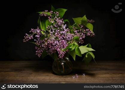 Lilac Purple Bouquet In Glass Vase in Studio