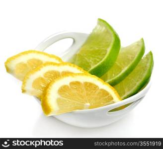 Lime And Lemon Slices In A White Dish