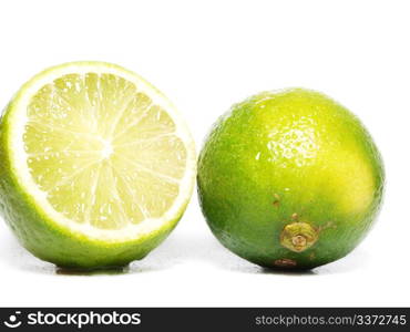 Lime fruit. Fresh green lime fruit towards white background