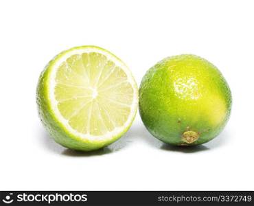 Lime fruit. Fresh green lime fruit towards white background