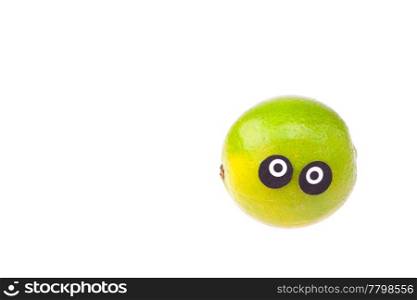 lime with eyes and faces isolated on white
