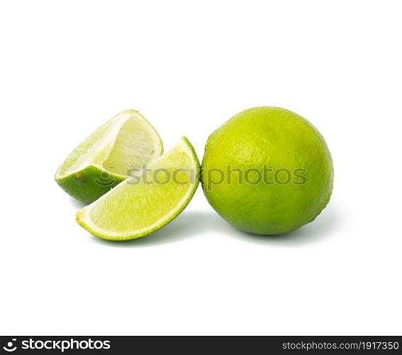 Lime with slice isolated on white background, close up