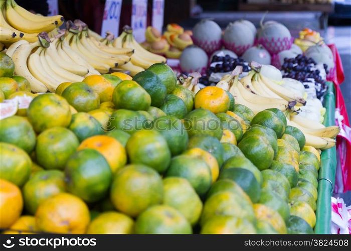 Limes at fruit stall in a traditional Taiwanese market