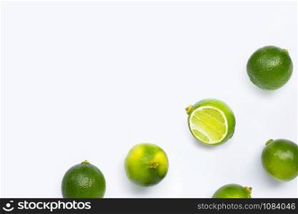 Limes isolated on white background. Copy space