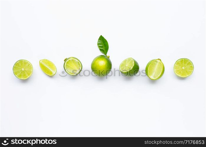 Limes isolated on white background. Top view