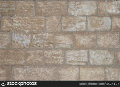 Limestone block wall. Limestone wall - rectangular stones creating texture.