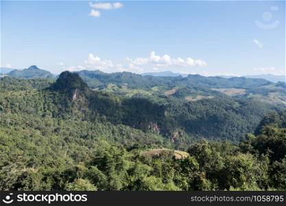 Limestone mountain range with the plantation area of the local inhabitant in the northern of Thailand.