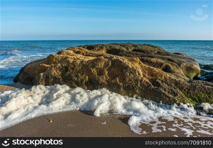 Limestone rock on the seashore near the village of Fontanka, Odessa region, Ukraine. Big Limestone rock on the seashore