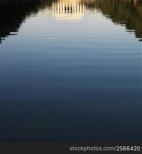 Lincoln Memorial reflected in water in Washington, D.C., USA.
