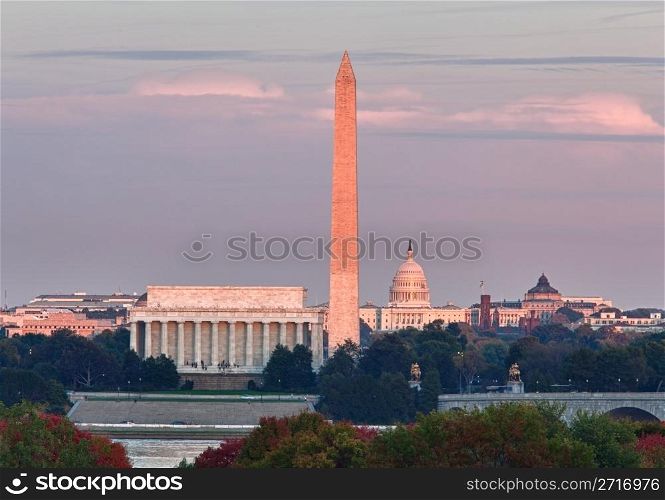 Lincoln Memorial, Washington Monument and Capitol building aligned as the sun starts to set in the fall