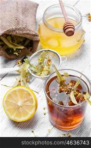 Linden herbal tea. Antiviral Linden tea with honey and lemon