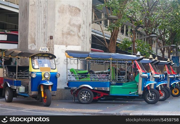 Line of tuktuks on Bangkok street, Thailand&#xA;