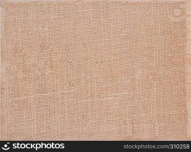 Linen fabric texture grunge on wooden board with scratches