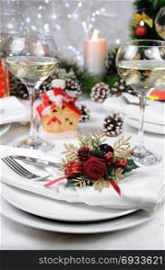Linen napkin, decorated with Christmas Corsage on the table