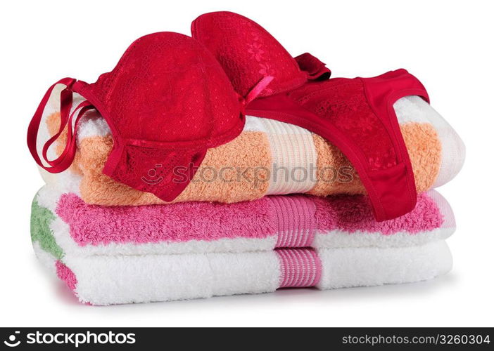 Lingerie on towels. Isolated