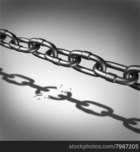 Link breaking and broken chain business concept as iron chains casting a shadow of a broken connection as a metaphor for freedom and the dreams and hopes of breaking out for success.