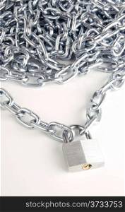 Link Chain Connected By Keyed Steel Locking Padlock on White