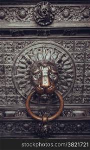 lion head as a knocker.