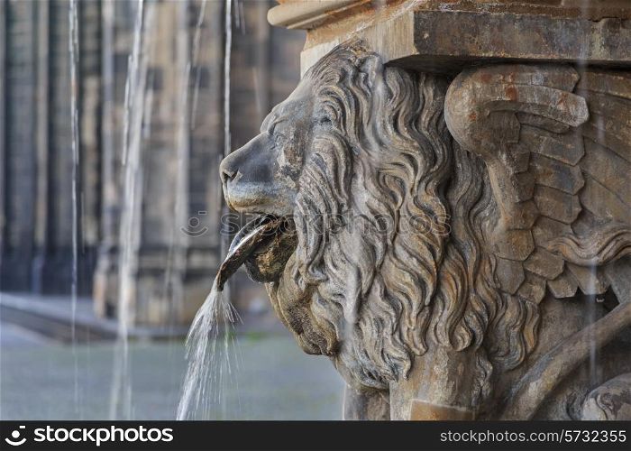 Lion statue and fountain on the square near Cologne cathedral, Germany&#xA;