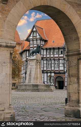 Lion statue and old timbered house in Braunschweig patio, Germany&#xA;